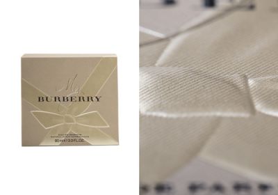 Folding carton with embossing on facing